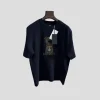 Fendi Men’s Black Cotton T-Shirt Featuring A Brown FF Monogram Dog Graphic With Gold Chain Detail