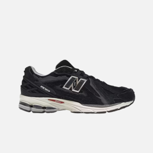 New Balance 1906R negras suela blanca