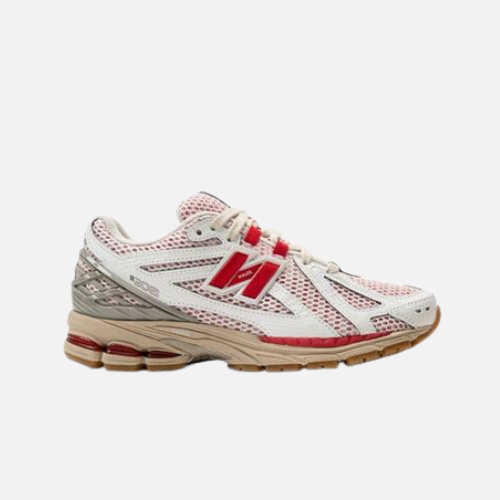 New Balance 1906R blancas N roja suela gum