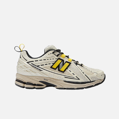 New Balance 1906R crema N amarilla detalles negro